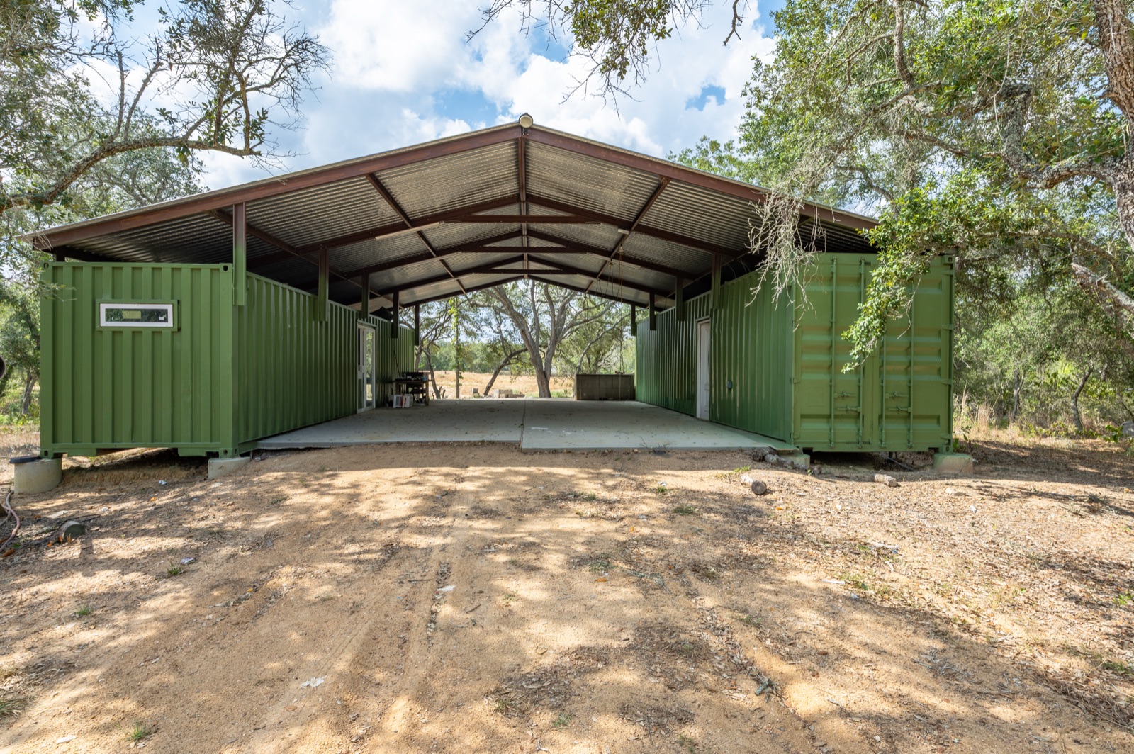 Hallettsville Weekend Retreat: Two container houses under the covered pavilion